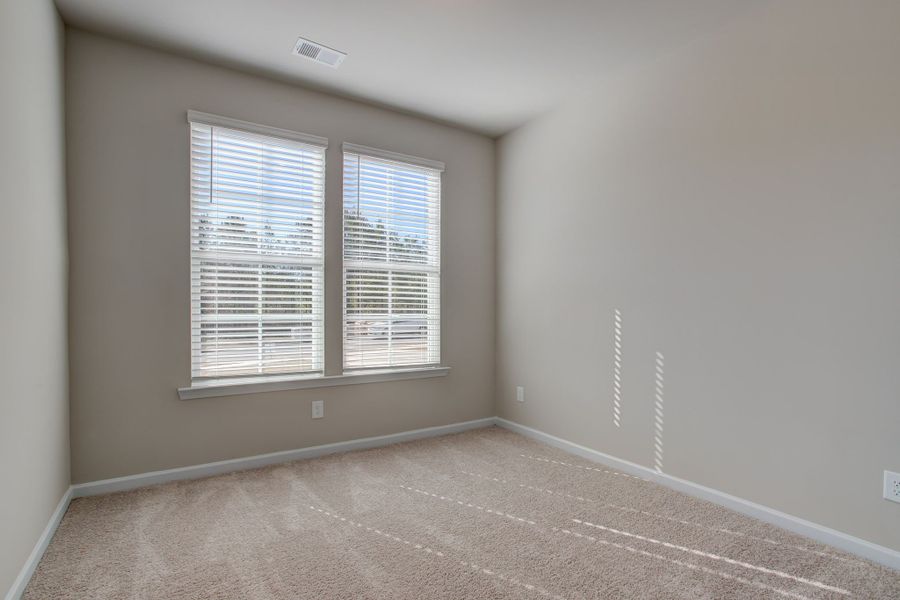 Bright and open bedroom #4 with walk-in closet