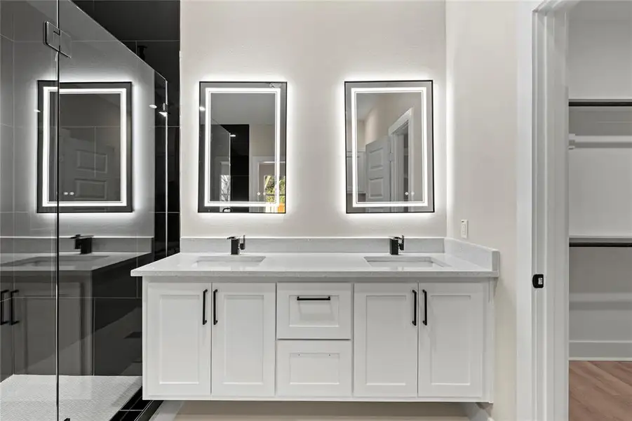 Bathroom with vanity and walk in shower