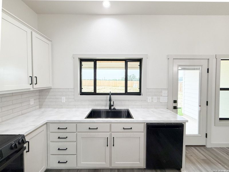 Furnished interior view inside a new home in , Devine (Image 14).