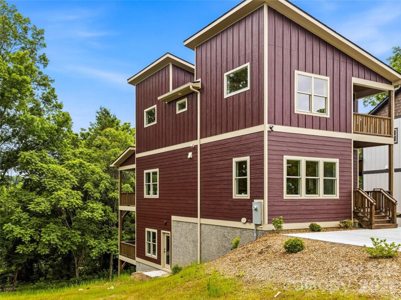 Front exterior of a new home in , Asheville, NC, highlighting curb appeal (Image 30).