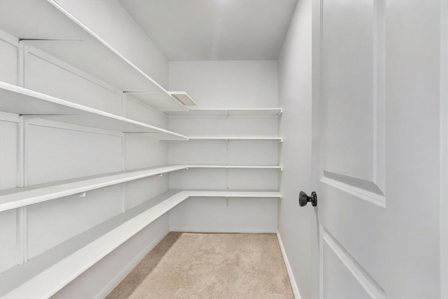 Storage area upstairs just off of the gameroom is perfect for games, linens and additional storage Storage area upstairs just off of the gameroom is perfect for games, linens and additional storage