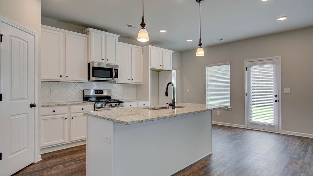 Representative furnished interior of a home built from the Vickery by DRB Homes in Berkeley Lakes, Locust Grove (Image 9).