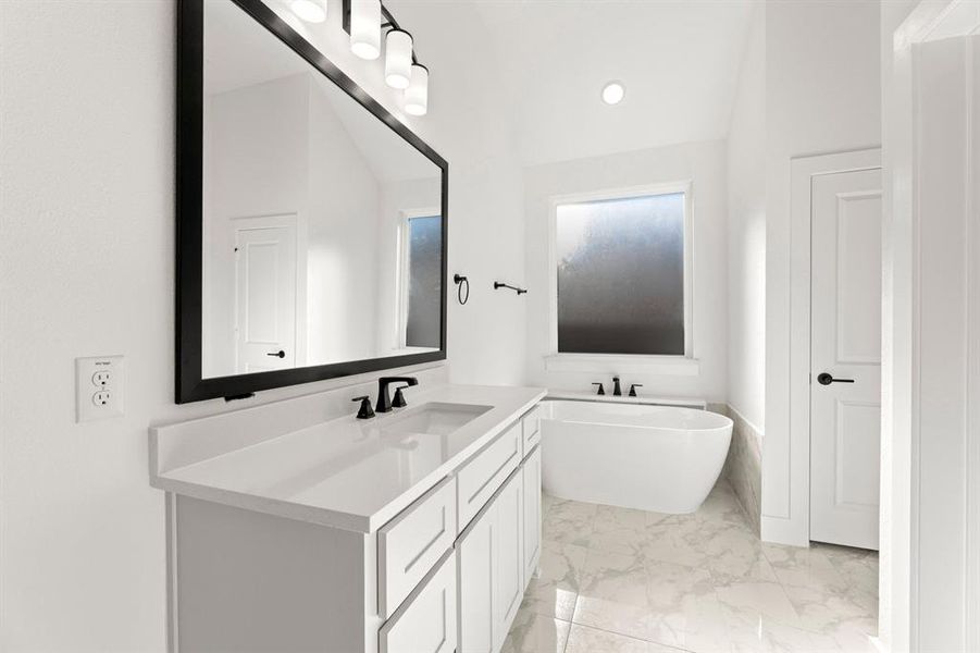 Furnished interior view inside a new home in Valencia on The Lake, Little Elm (Image 12).