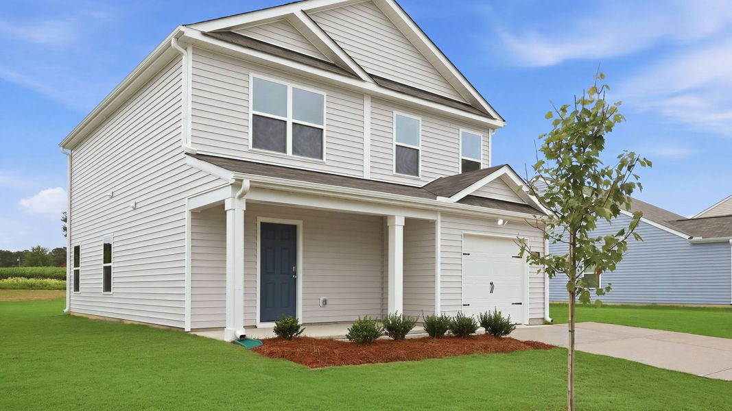 Front exterior of a new home in Hobbs Farm, Ayden, NC, highlighting curb appeal (Image 21). Front exterior of a new home in Hobbs Farm, Ayden, NC, highlighting curb appeal (Image 21).