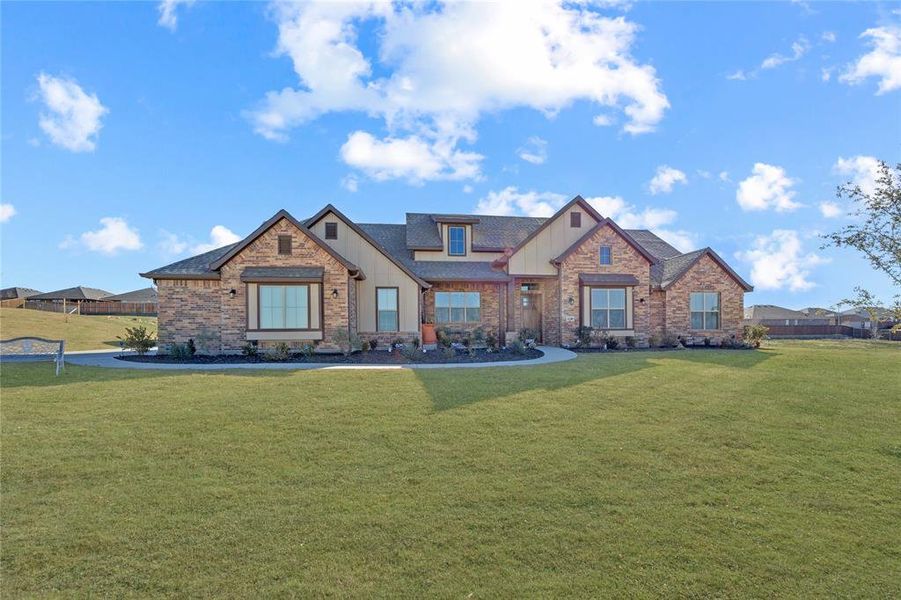 Craftsman house featuring a front yard Craftsman house featuring a front yard