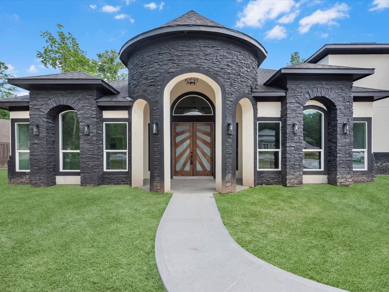 Front exterior of a new home in , Dayton, TX, highlighting curb appeal (Image 18).