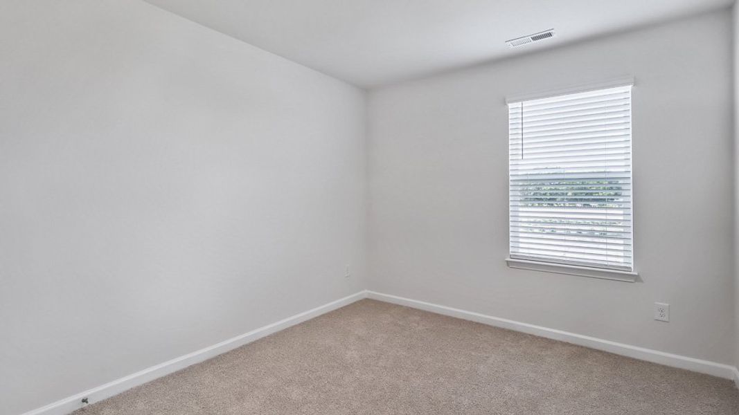 Spacious, unfurnished interior of a new home in The Townes at Honeycutt Oaks, Angier (Image 17). Spacious, unfurnished interior of a new home in The Townes at Honeycutt Oaks, Angier (Image 17).
