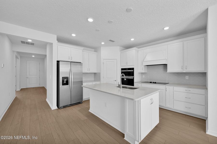 Furnished interior view inside a new home in Hyland Trail, Green Cove Springs (Image 11).