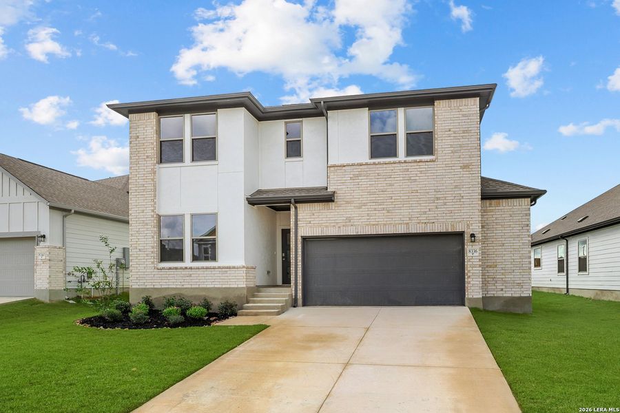 Front exterior of a new home in Garden Grove, San Antonio, TX, highlighting curb appeal (Image 2). Front exterior of a new home in Garden Grove, San Antonio, TX, highlighting curb appeal (Image 2).