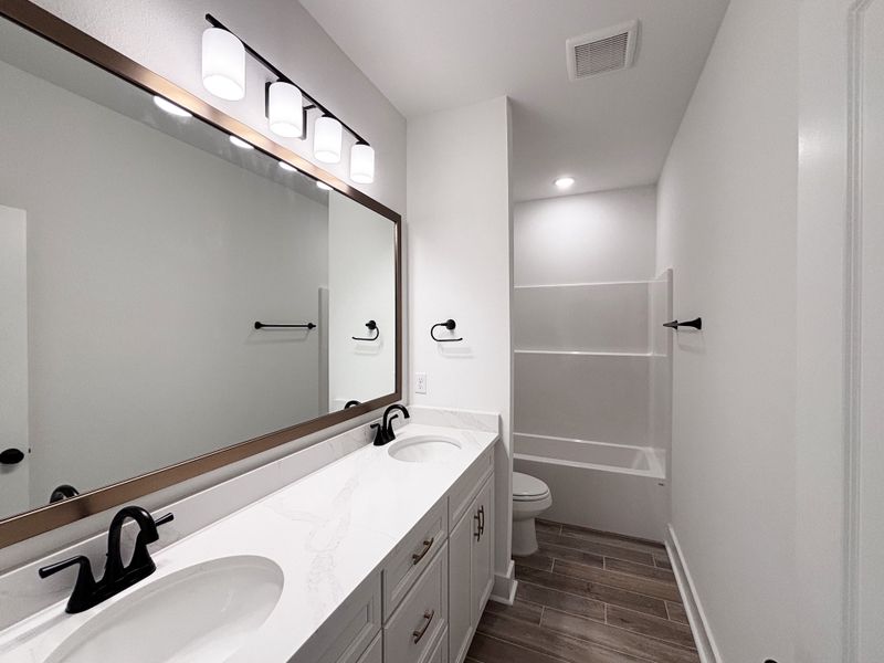 Furnished interior view inside a new home in Bird Song at Hammock Bay, Freeport (Image 11).