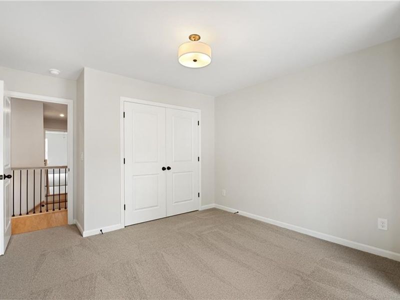 Spacious, unfurnished interior of a new home in The Village at Shallowford, Kennesaw (Image 29).
