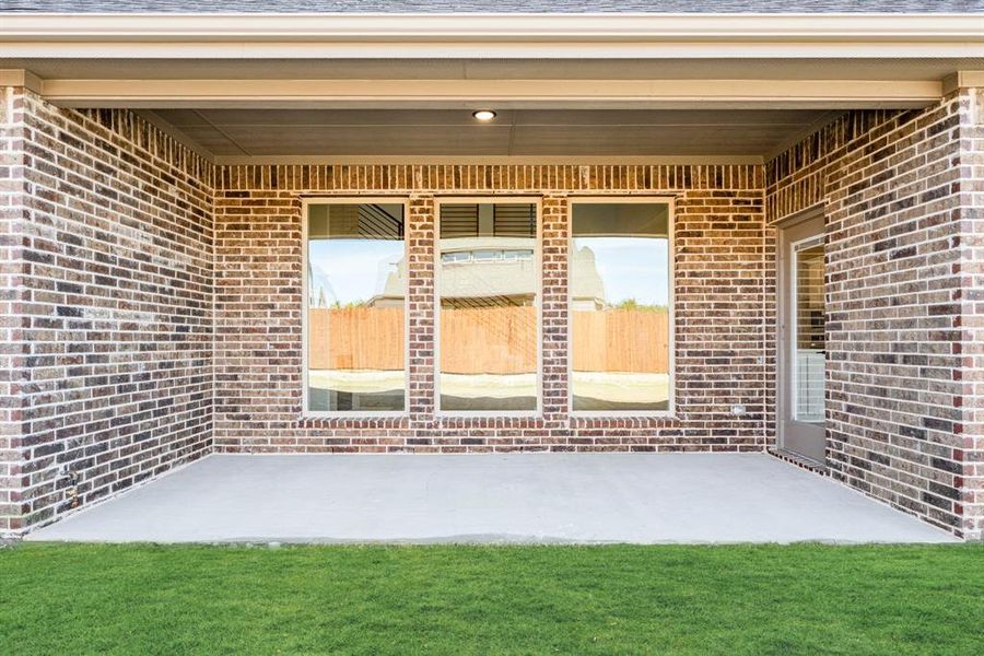 Exterior details and patio area of a home in Addison Hills Classic 60s, Cedar Hill (Image 3).