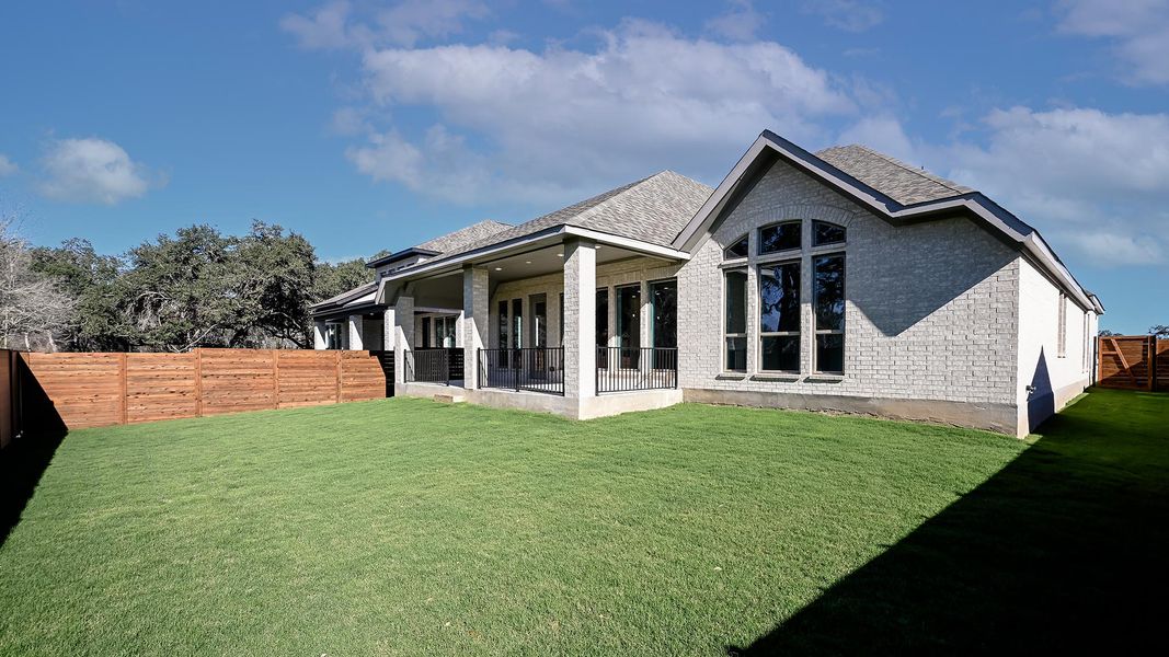 Exterior details and patio area of a home in Juniper Springs, Lockhart (Image 24).