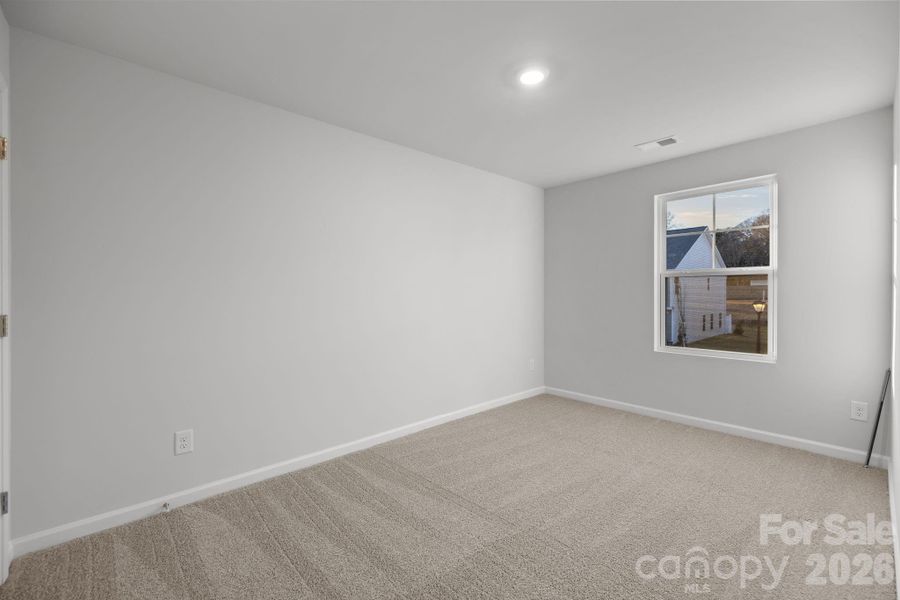 Spacious, unfurnished interior of a new home in Townes at Ribbon Walk, Charlotte (Image 15).