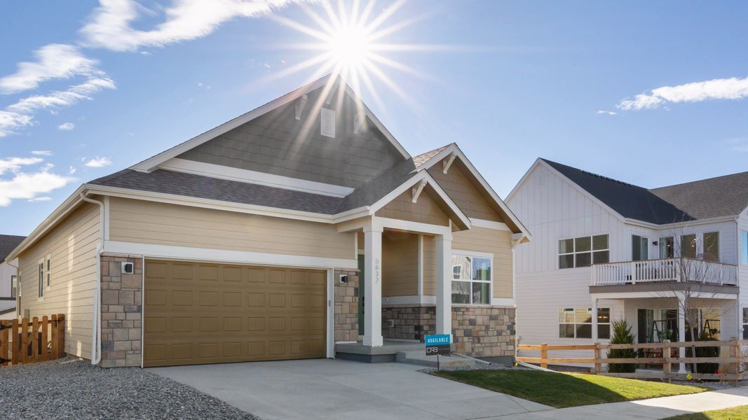 Front exterior of a new home in Dillon Pointe - Journey, Broomfield, CO, highlighting curb appeal (Image 21).