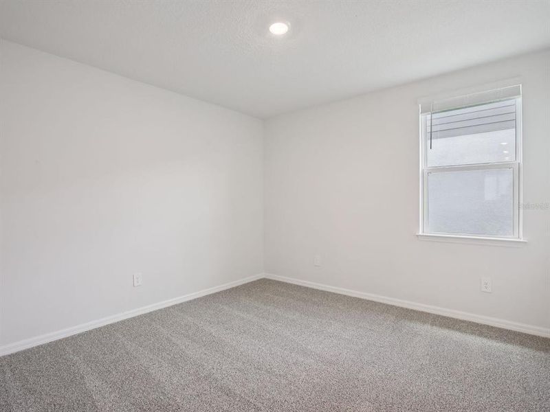 Spacious, unfurnished interior of a new home in Oakfield Trails - Signature Series, Parrish (Image 8).