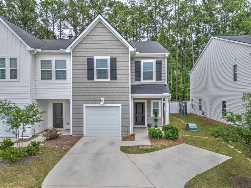 Front exterior of a new home in , Charleston, SC, highlighting curb appeal (Image 24).