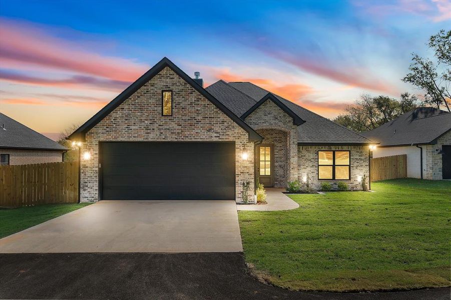 Front exterior of a new home in , Athens, TX, highlighting curb appeal (Image 1). Front exterior of a new home in , Athens, TX, highlighting curb appeal (Image 1).