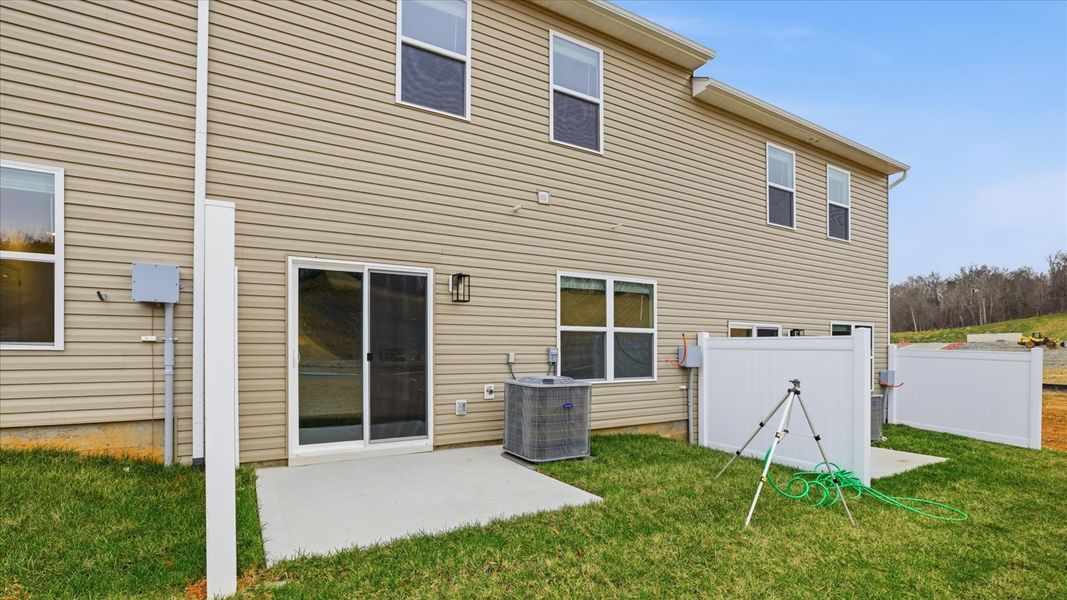 Exterior details and patio area of a home in Cherokee Crossing, Kodak (Image 2).
