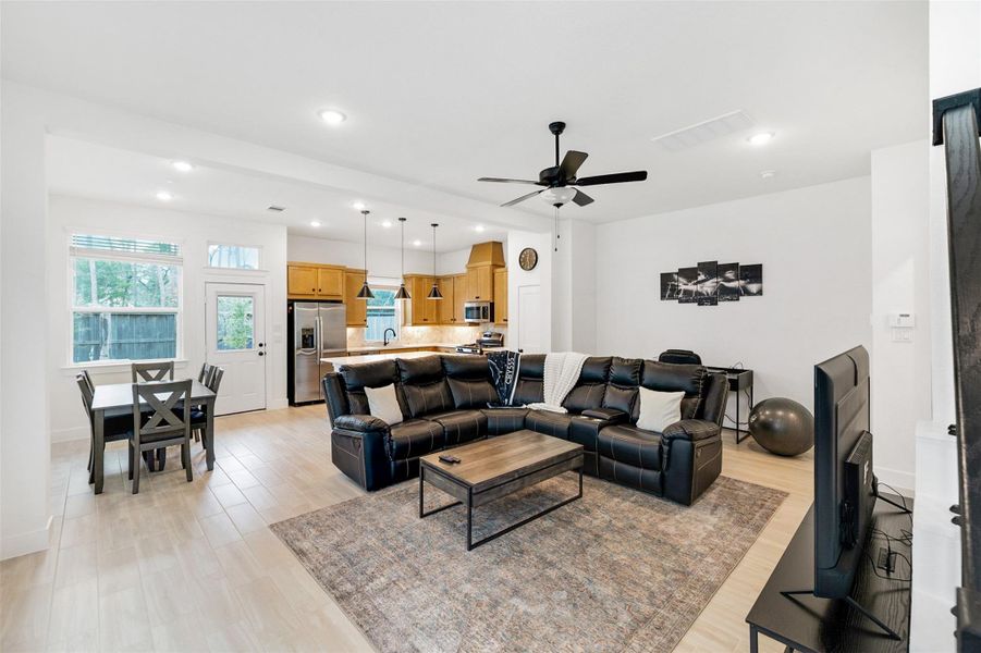 Beautiful wood-like tile ties all the living areas together with both style and function. Beautiful wood-like tile ties all the living areas together with both style and function.