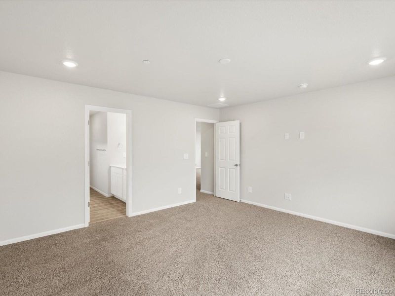 Spacious, unfurnished interior of a new home in Buffalo Highlands: The Flora Collection, Commerce City (Image 19).