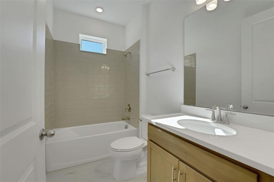 Furnished interior view inside a new home in Green Key Village, Lady Lake (Image 11).