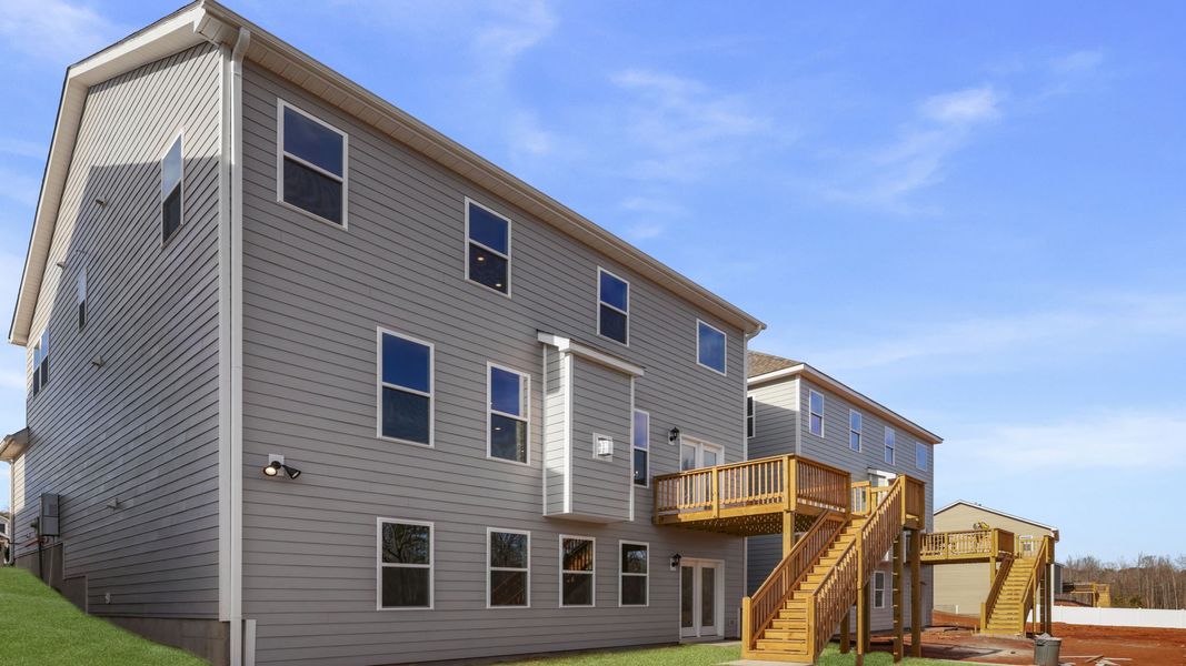 Exterior details and patio area of a home in Whitehawk Meadows, Travelers Rest (Image 23).