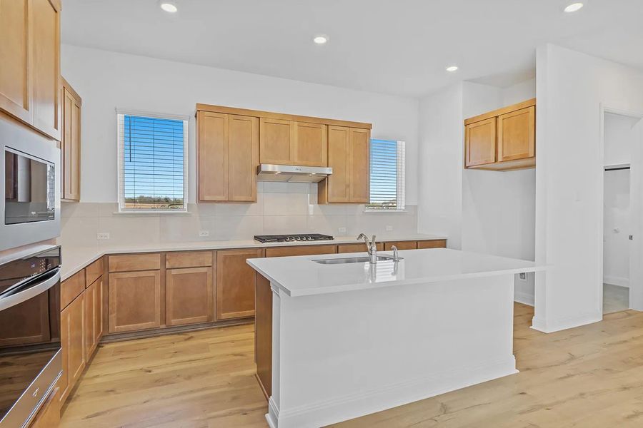 Furnished interior view inside a new home in The Colony - 50', Bastrop (Image 10).
