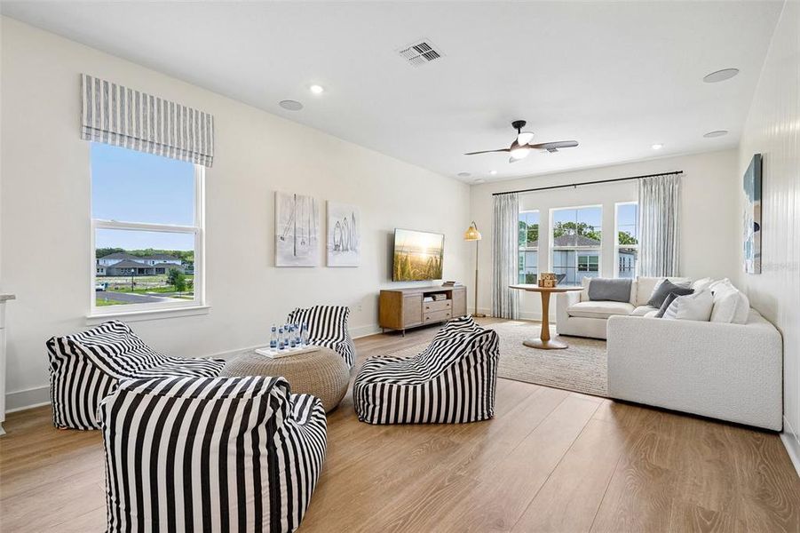 Furnished interior view inside a new home in Northlake at Ovation, Winter Garden (Image 31).