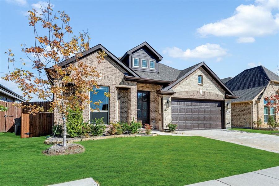 Front exterior of a new home in Ridge Ranch Classic 50, Mesquite, TX, highlighting curb appeal (Image 1). Front exterior of a new home in Ridge Ranch Classic 50, Mesquite, TX, highlighting curb appeal (Image 1).