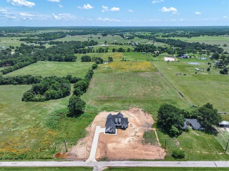 Aerial overview of property's location featuring rural landscape