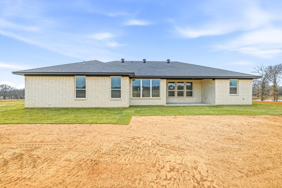 Exterior details and patio area of a home in Taylor Ranch, Springtown (Image 24).