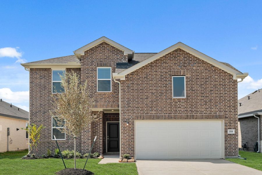 Front exterior of a new home in Aspire at The Hills of Town Creek, Montgomery, TX, highlighting curb appeal (Image 2).
