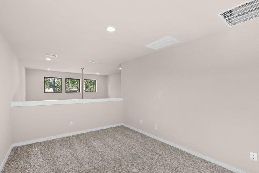This room invites you to kick back and let the good times roll! This room invites you to kick back and let the good times roll!