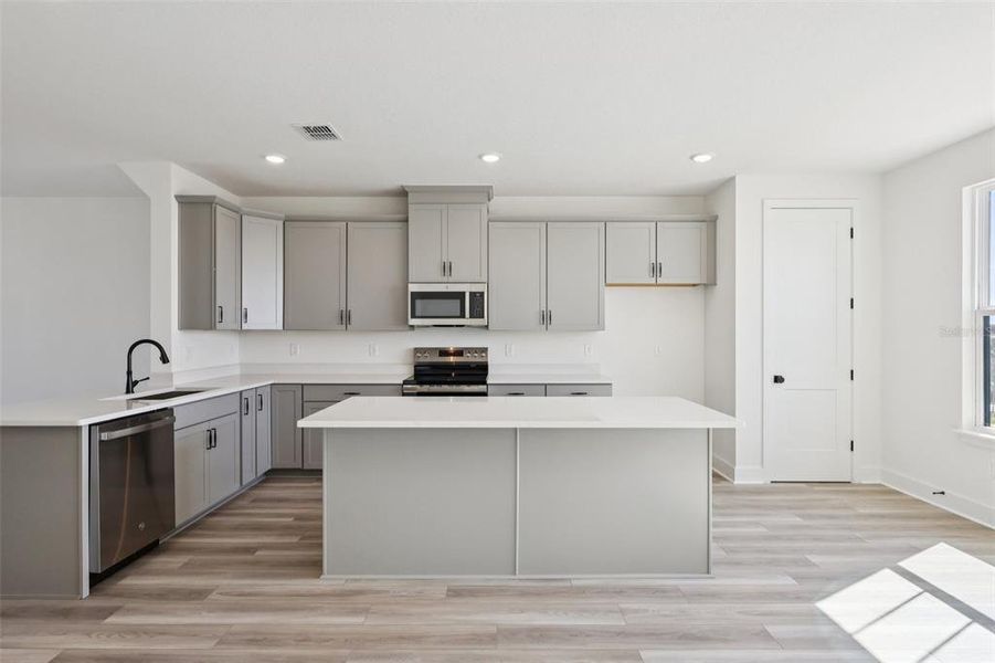 Furnished interior view inside a new home in Parkview at Hamlin, Winter Garden (Image 4). Furnished interior view inside a new home in Parkview at Hamlin, Winter Garden (Image 4).