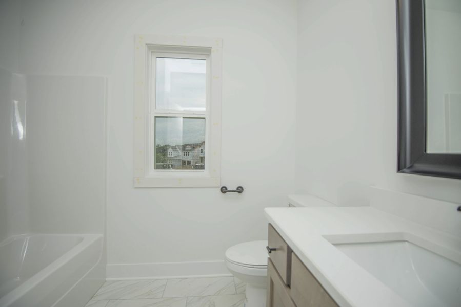 *Photo of example home. Selections and Finishes May Vary.*