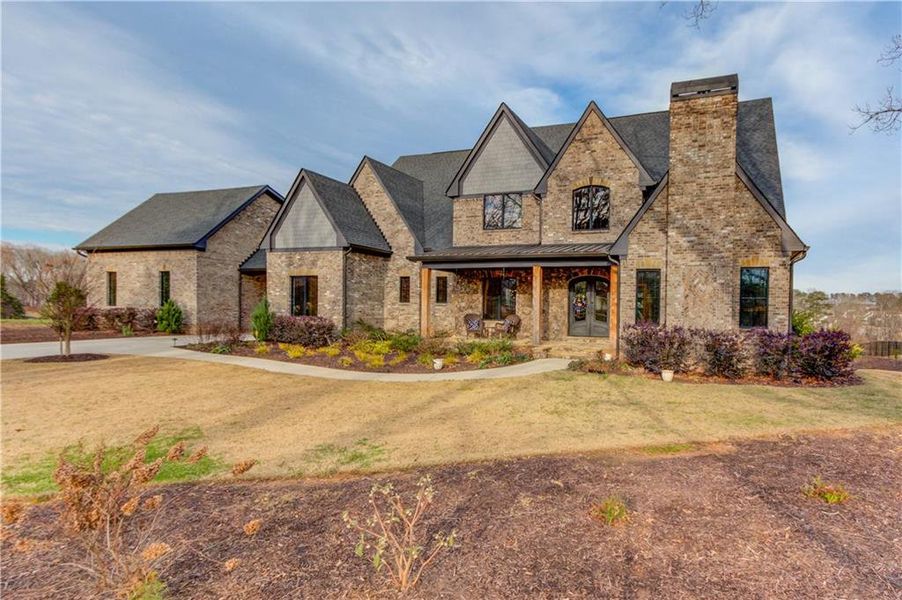 Front exterior of a new home in , Dacula, GA, highlighting curb appeal (Image 23). Front exterior of a new home in , Dacula, GA, highlighting curb appeal (Image 23).
