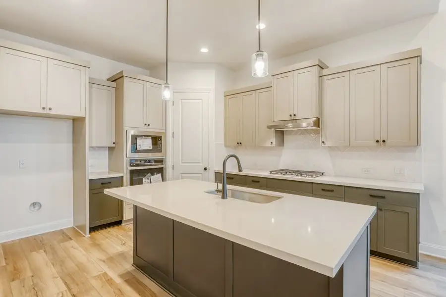 Furnished interior view inside a new home in 6 Creeks, Kyle (Image 3).