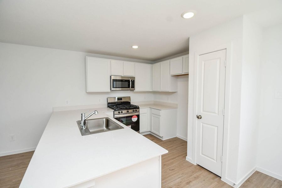 Furnished interior view inside a new home in Ladera Trails, Conroe (Image 13).