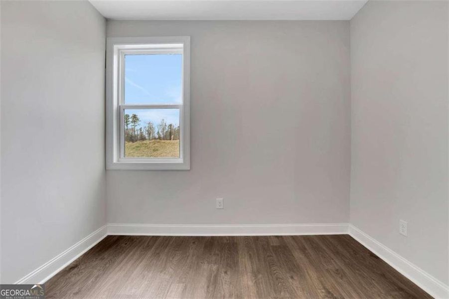 Spacious, unfurnished interior of a new home in The Paddocks at Doc Hughes, Buford (Image 44).