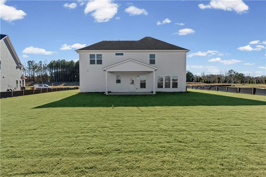 Exterior details and patio area of a home in Creekside at Skelton, Jefferson (Image 29).