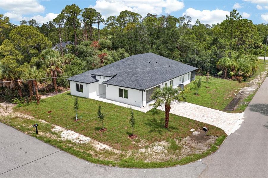 Front exterior of a new home in , Port Charlotte, FL, highlighting curb appeal (Image 21). Front exterior of a new home in , Port Charlotte, FL, highlighting curb appeal (Image 21).
