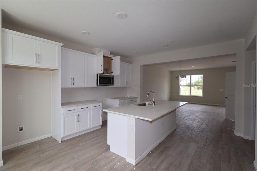 Furnished interior view inside a new home in Center Lake on the Park, St. Cloud (Image 8).