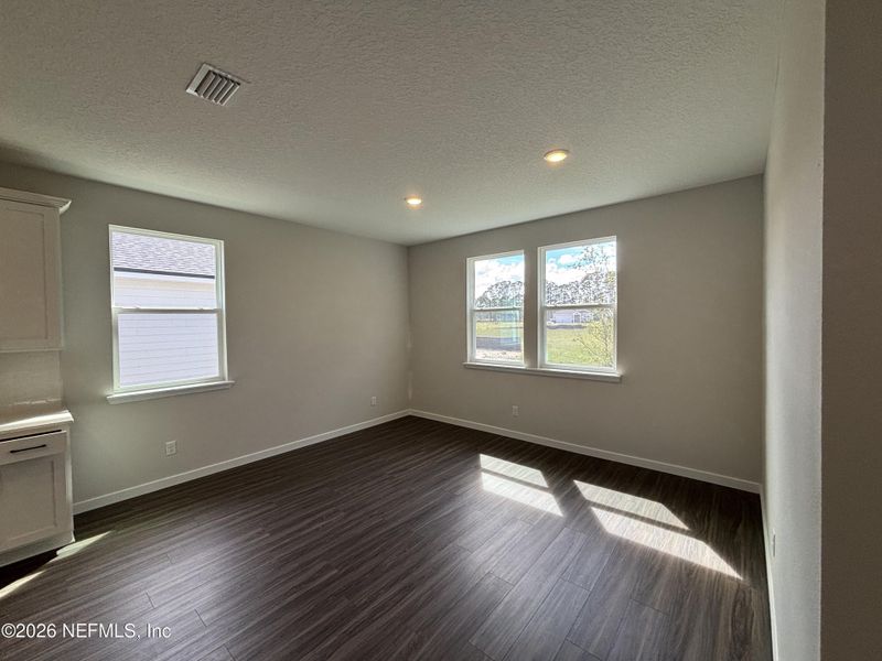 Spacious, unfurnished interior of a new home in The Cypress Series at Reserve East, Flagler Beach (Image 21).