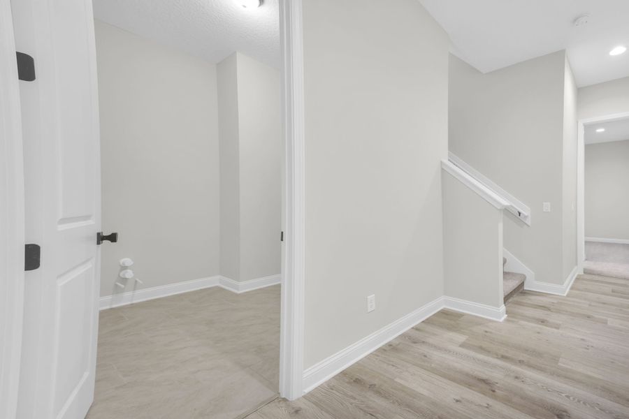 Representative unfurnished interior of a home built from the Avondale by Riverside Homes in Hidden Creek at SilverLeaf 80' Series, St. Augustine (Image 35).