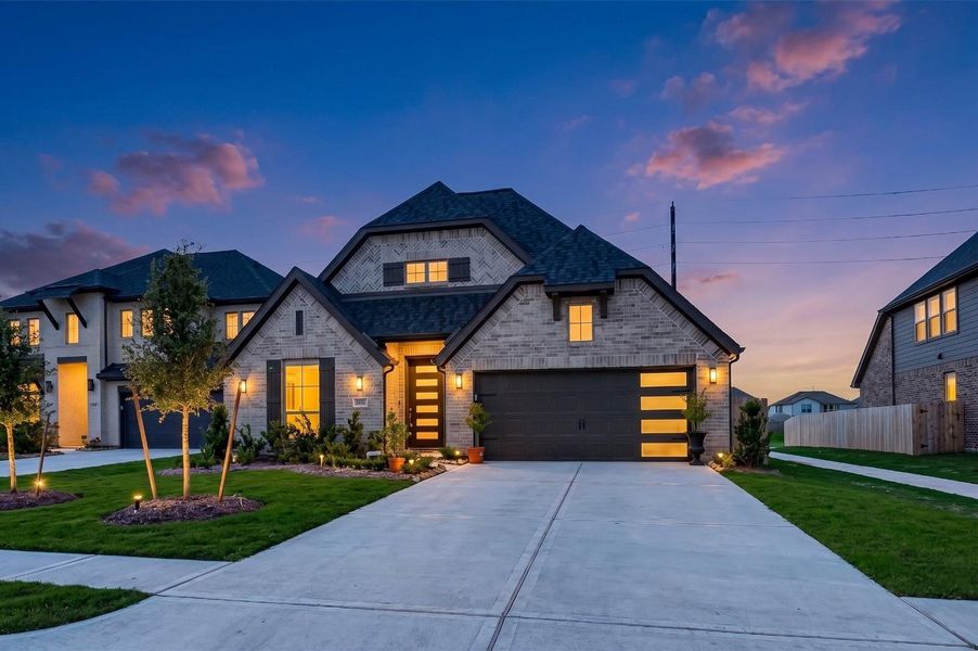Stunning 4-bedroom, 3-bath Perry Homes home, with NO BACK NEIGHBORS, in the highly desirable Stone Creek community, offering exceptional curb appeal and thoughtful design and many upgrades throughout. Showcasing a beautiful brick elevation with elegant exterior shutters, an impressive 8-foot wood and glass front door, and a covered patio perfect for outdoor living, this home seamlessly blends timeless style, comfort, and everyday luxury. Twilight enhanced photo Stunning 4-bedroom, 3-bath Perry Homes home, with NO BACK NEIGHBORS, in the highly desirable Stone Creek community, offering exceptional curb appeal and thoughtful design and many upgrades throughout. Showcasing a beautiful brick elevation with elegant exterior shutters, an impressive 8-foot wood and glass front door, and a covered patio perfect for outdoor living, this home seamlessly blends timeless style, comfort, and everyday luxury. Twilight enhanced photo