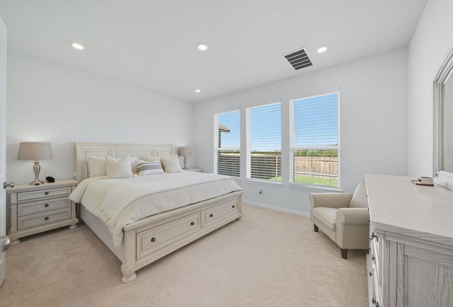 Bedroom with light carpet and recessed lighting Bedroom with light carpet and recessed lighting