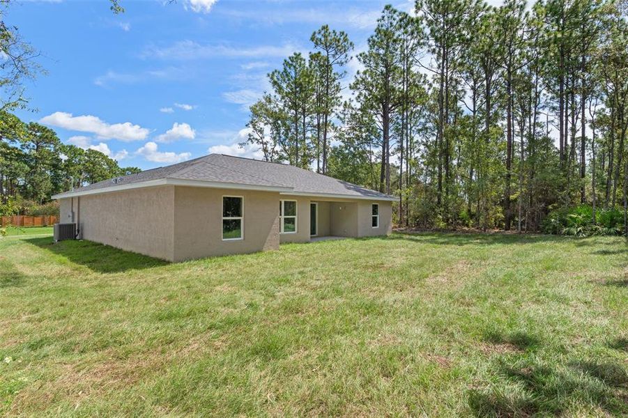 Front exterior of a new home in , Citrus Springs, FL, highlighting curb appeal (Image 21).