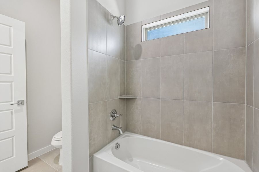 Secondary Bathroom in the Gilmour II home plan by Trophy Signature Homes