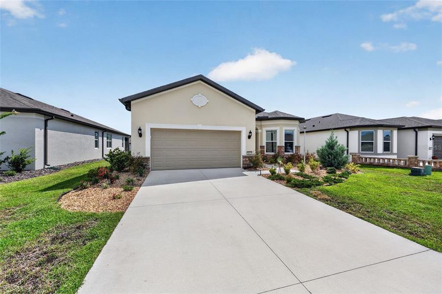Front exterior of a new home in , Ocala, FL, highlighting curb appeal (Image 22).
